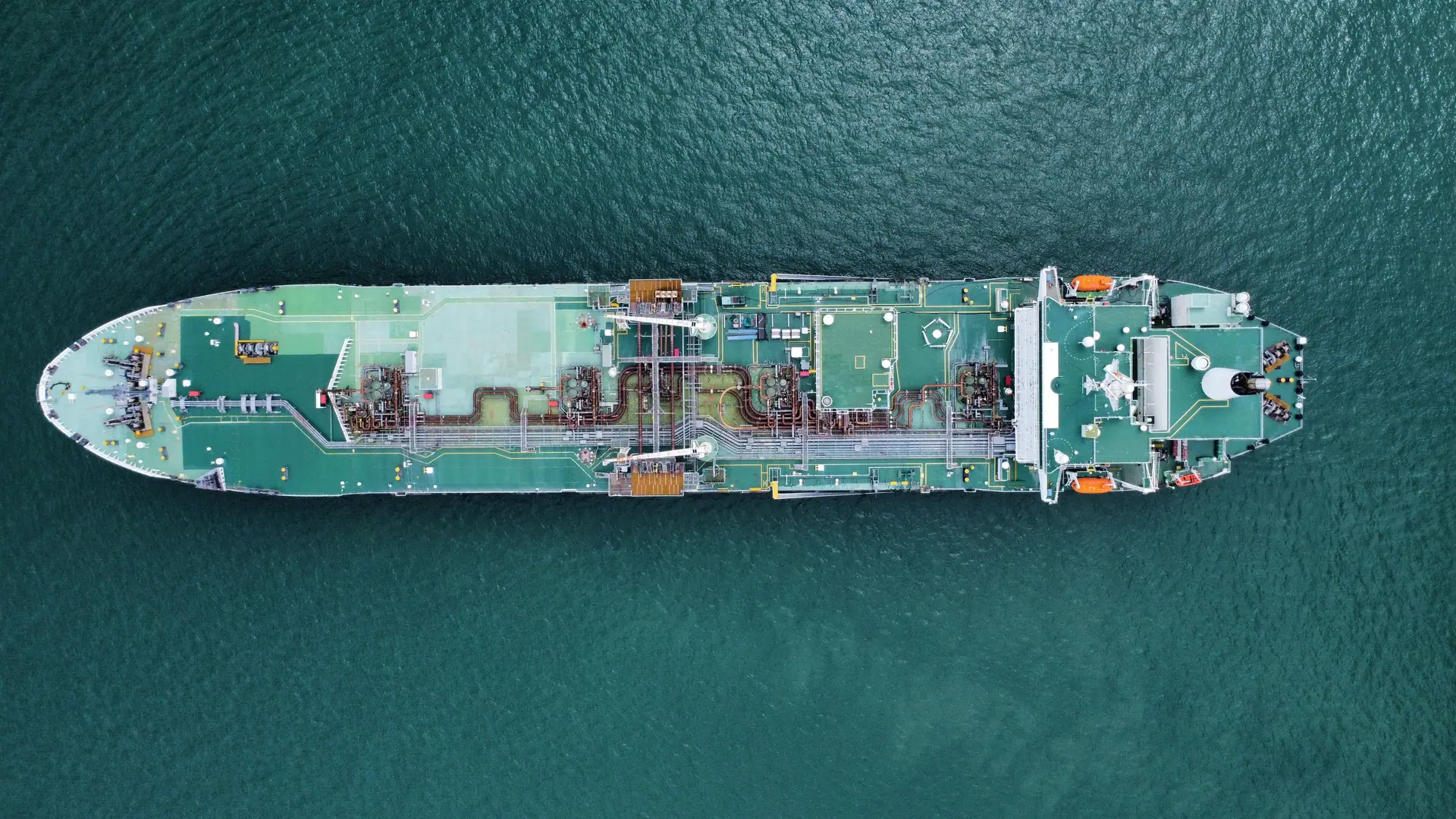 Product tanker under way on open water viewed from above.